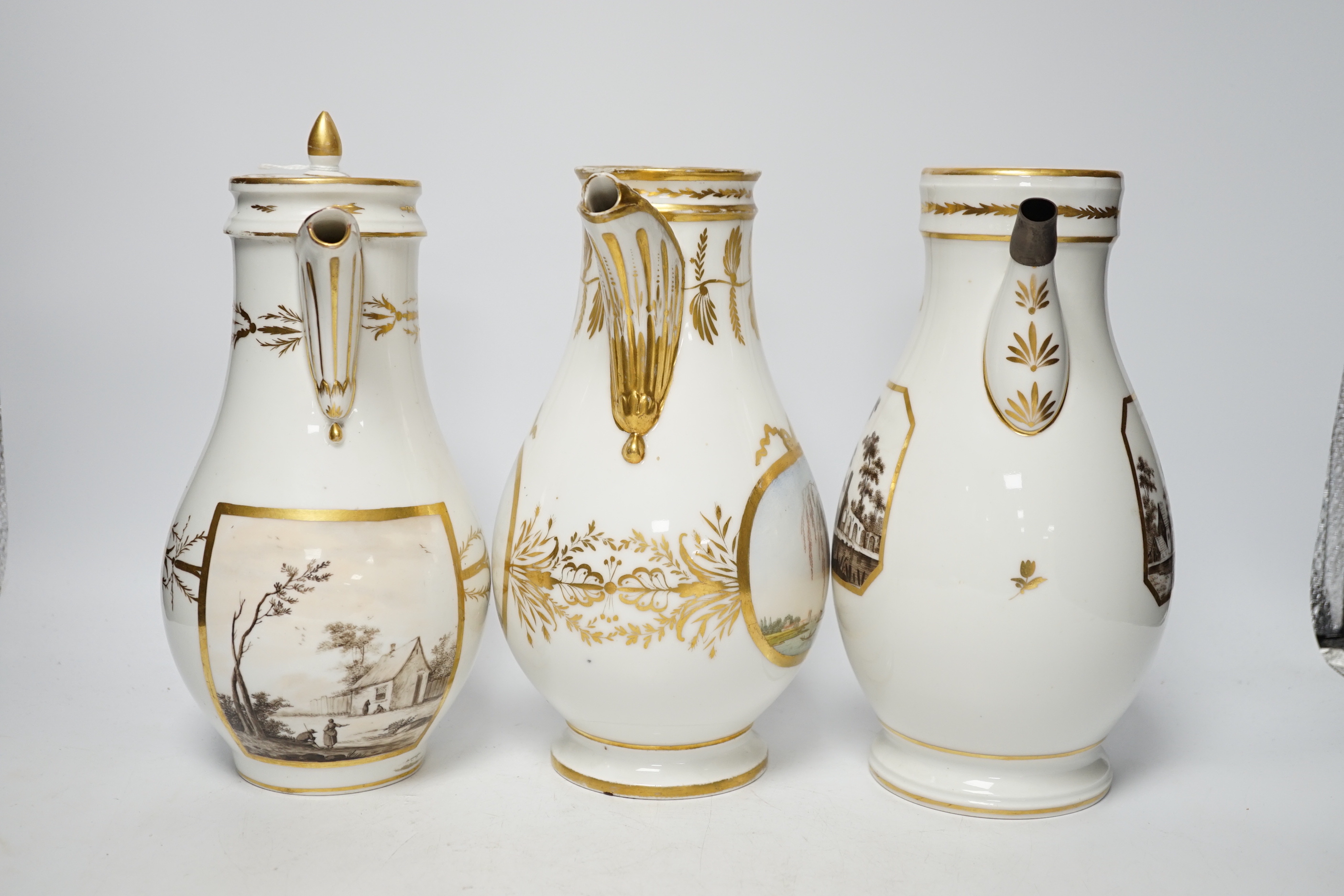 A pair and another 19th century French porcelain coffee pots, one with cover, 27cm